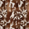 A close-up of Tkanina wodoodporna futro brązowa krowa 1 reveals a rustic texture with brown and white cowhide patterns, featuring irregular patches and large white areas blended with shades of brown.